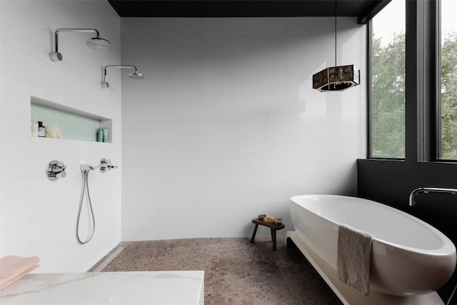 2700 Stratford Dr, Austin, TX 78746 - full bathroom with a soaking tub, a tile shower, and plenty of natural light