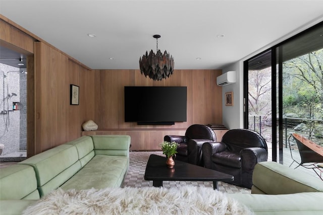 2700 Stratford Dr, Austin, TX 78746 - living area featuring a wall unit AC, wooden walls, and a chandelier