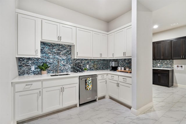 2421 High Lonesome, Leander, TX 78641 - kitchen featuring a sink, light countertops, stainless steel dishwasher, and marble finish floor