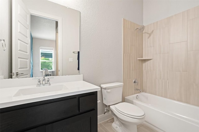 2421 High Lonesome, Leander, TX 78641 - full bathroom featuring toilet, a textured wall, shower / bathing tub combination, and vanity