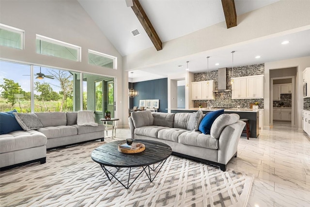 2421 High Lonesome, Leander, TX 78641 - living area with visible vents, marble finish floor, beamed ceiling, high vaulted ceiling, and recessed lighting