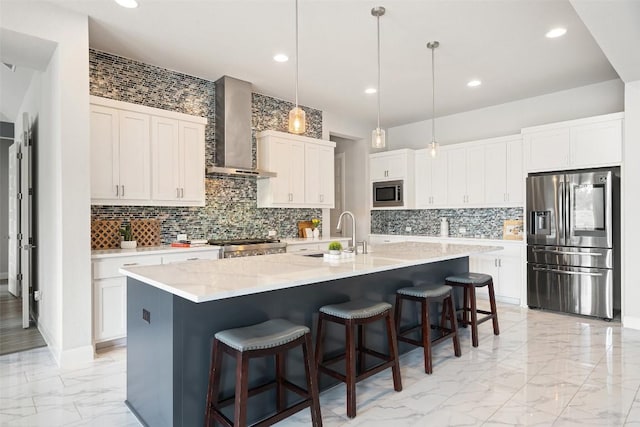 2421 High Lonesome, Leander, TX 78641 - kitchen featuring a sink, white cabinets, marble finish floor, stainless steel appliances, and wall chimney exhaust hood