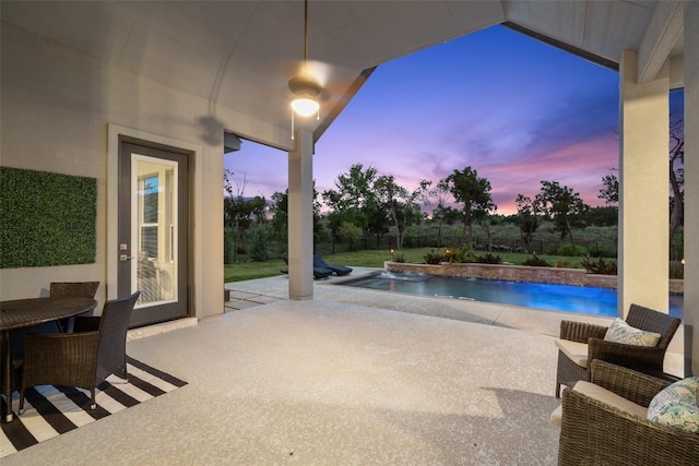 2421 High Lonesome, Leander, TX 78641 - pool at dusk featuring a patio and an outdoor pool