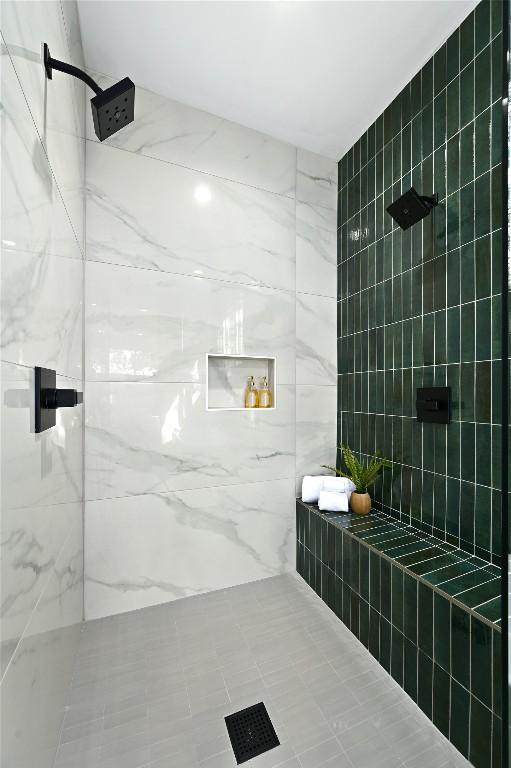 3004 Ray Wood Dr, Austin, TX 78704 - full bath featuring a marble finish shower and tile walls