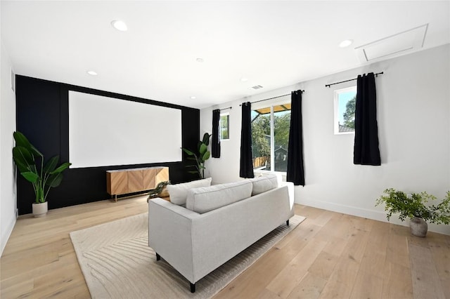 3004 Ray Wood Dr, Austin, TX 78704 - cinema room featuring light wood-style floors, baseboards, and recessed lighting