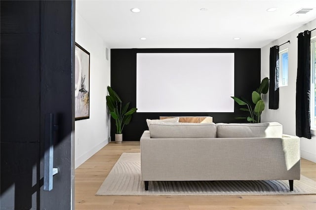 3004 Ray Wood Dr, Austin, TX 78704 - home theater room featuring light wood-type flooring, recessed lighting, and baseboards