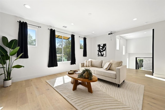 3004 Ray Wood Dr, Austin, TX 78704 - living room with recessed lighting, light wood-style floors, and baseboards