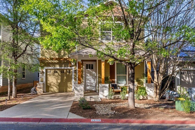 2608 Lightfoot Trl, Austin, TX 78745 - obstructed view of property featuring concrete driveway and covered porch