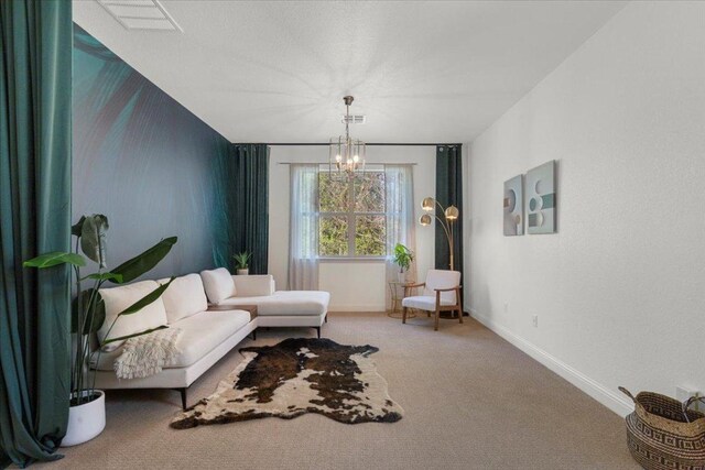 2608 Lightfoot Trl, Austin, TX 78745 - living area featuring a chandelier, baseboards, and carpet