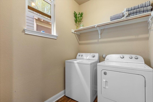 2608 Lightfoot Trl, Austin, TX 78745 - laundry room with washing machine and clothes dryer and baseboards