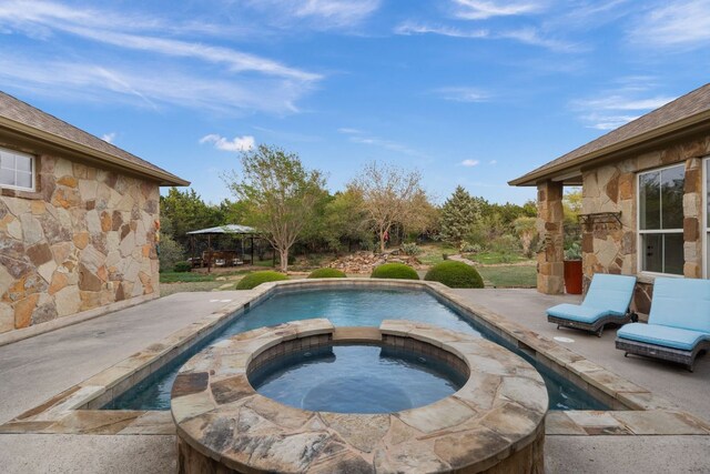 15086 Barrie Dr, Austin, TX 78734 - outdoor pool with an in-ground hot tub and a patio area