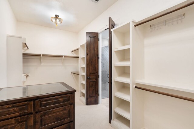 15086 Barrie Dr, Austin, TX 78734 - walk in closet featuring light colored carpet