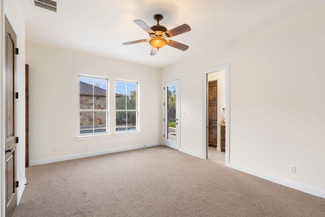 15086 Barrie Dr, Austin, TX 78734 - unfurnished room with light colored carpet, ceiling fan, and baseboards