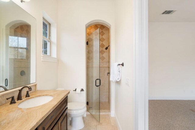15086 Barrie Dr, Austin, TX 78734 - bathroom with vanity, a stall shower, and toilet