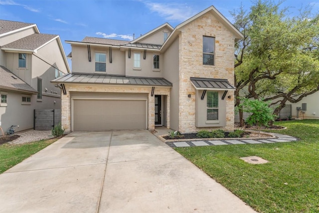 1213 Silver Dollar Trl, Georgetown, TX 78628 - view of front of home with a standing seam roof, a garage, driveway, a front lawn, and stone siding