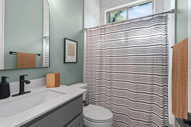 1213 Silver Dollar Trl, Georgetown, TX 78628 - bathroom featuring toilet, vanity, and a shower with shower curtain