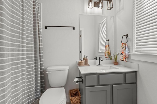1213 Silver Dollar Trl, Georgetown, TX 78628 - full bathroom featuring vanity and toilet