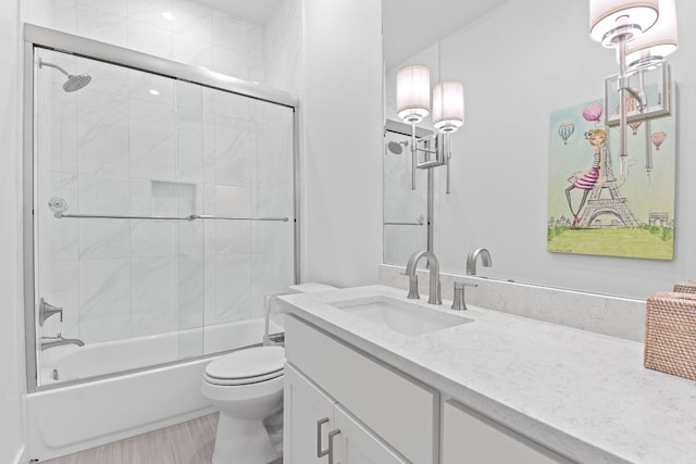108 Fishspear Ln, Georgetown, TX 78628 - bathroom with vanity, shower / bath combination with glass door, and wood finished floors