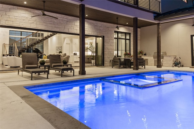 108 Fishspear Ln, Georgetown, TX 78628 - view of pool with a ceiling fan, stairway, area for grilling, and a pool with connected hot tub