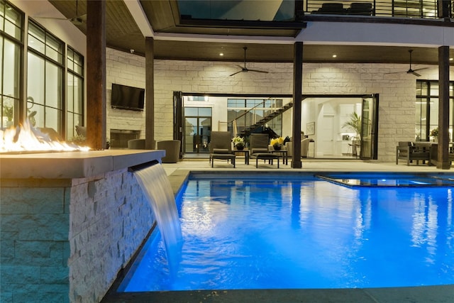 108 Fishspear Ln, Georgetown, TX 78628 - view of pool featuring a ceiling fan, stairway, a pool with connected hot tub, and a patio area