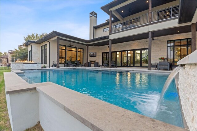 108 Fishspear Ln, Georgetown, TX 78628 - outdoor pool with a patio area and a ceiling fan