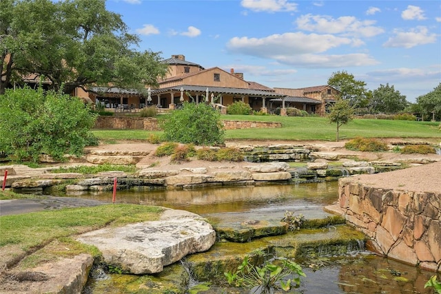 108 Fishspear Ln, Georgetown, TX 78628 - exterior space with a small pond