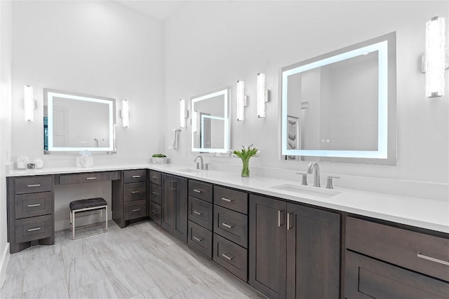 108 Fishspear Ln, Georgetown, TX 78628 - full bathroom with double vanity and marble finish floors