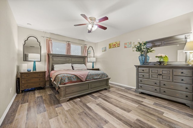 30336 Tiger Woods Dr, Georgetown, TX 78628 - bedroom featuring wood finished floors and a ceiling fan