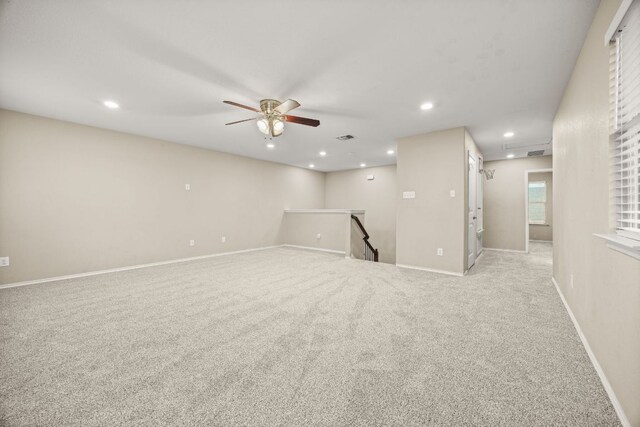 30336 Tiger Woods Dr, Georgetown, TX 78628 - spare room with carpet, recessed lighting, ceiling fan, and baseboards