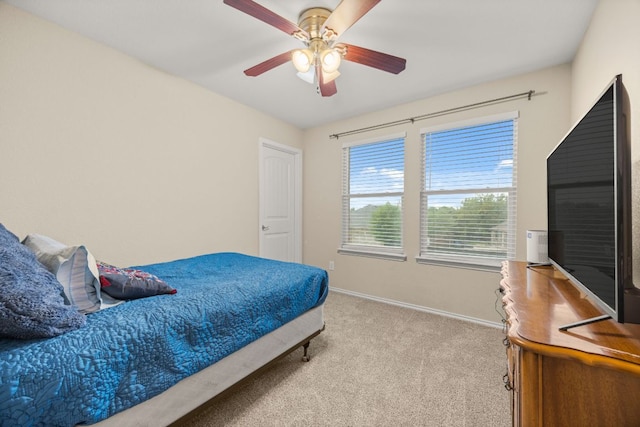 30336 Tiger Woods Dr, Georgetown, TX 78628 - bedroom with carpet and a ceiling fan