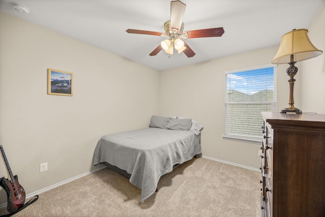 30336 Tiger Woods Dr, Georgetown, TX 78628 - bedroom featuring baseboards, carpet flooring, and a ceiling fan