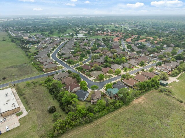 30336 Tiger Woods Dr, Georgetown, TX 78628 - aerial view of property's location with nearby suburban area
