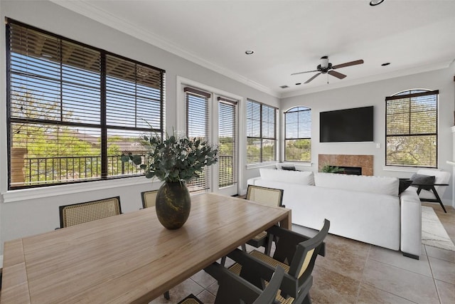 4000 Ranch Road 620 N Unit 8, Austin, TX 78734 - dining space featuring a ceiling fan, ornamental molding, a fireplace, recessed lighting, and baseboards