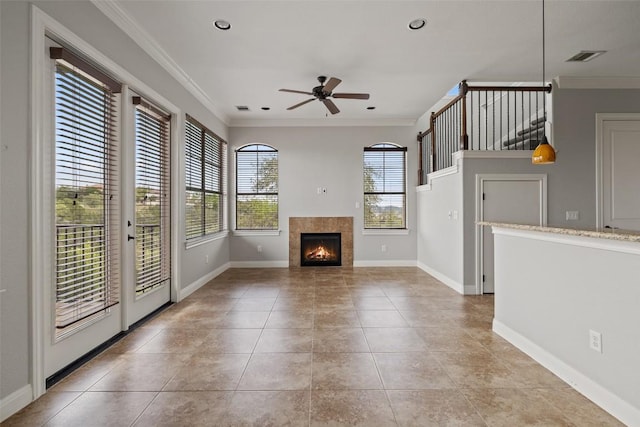 4000 Ranch Road 620 N Unit 8, Austin, TX 78734 - unfurnished living room with a ceiling fan, ornamental molding, baseboards, a tile fireplace, and light tile patterned flooring