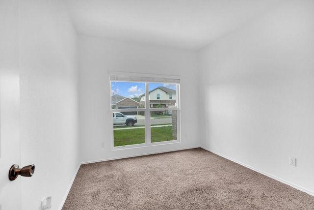 219 George Neggan Ln, Bastrop, TX 78602 - spare room with baseboards and carpet