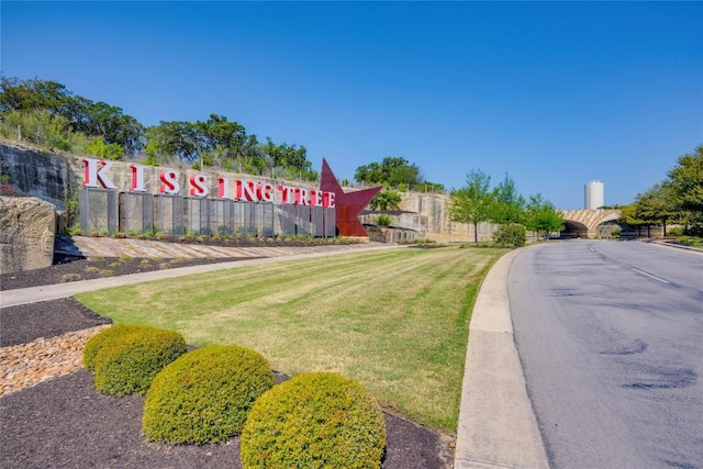 121 Harborside Dr Unit 102, San Marcos, TX 78666 - view of asphalt road featuring curbs