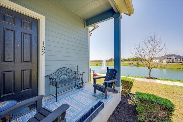 view of patio / terrace featuring a water view