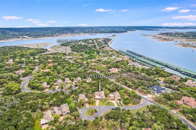 aerial view with a residential view and a water view