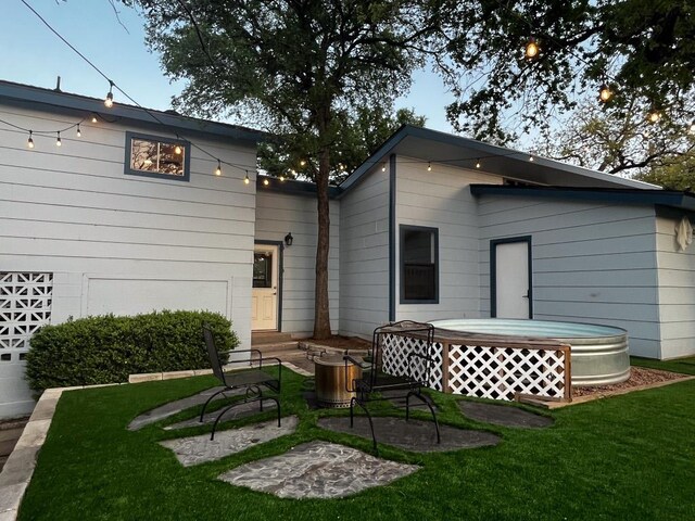 421 E Briarway Dr, Marble Falls, TX 78654 - back of house with a lawn