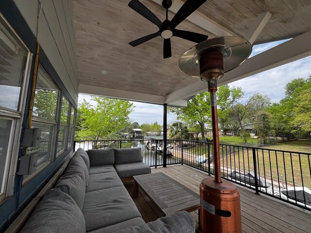 421 E Briarway Dr, Marble Falls, TX 78654 - wooden deck with an outdoor living space, a water view, and a ceiling fan