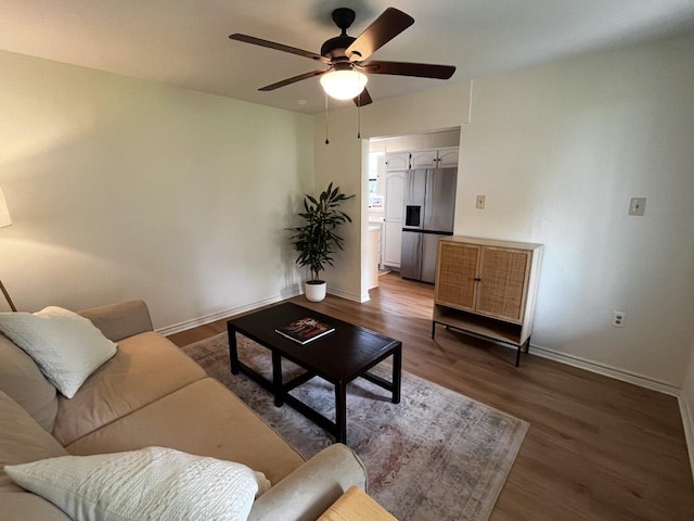 421 E Briarway Dr, Marble Falls, TX 78654 - living area featuring ceiling fan, wood finished floors, and baseboards