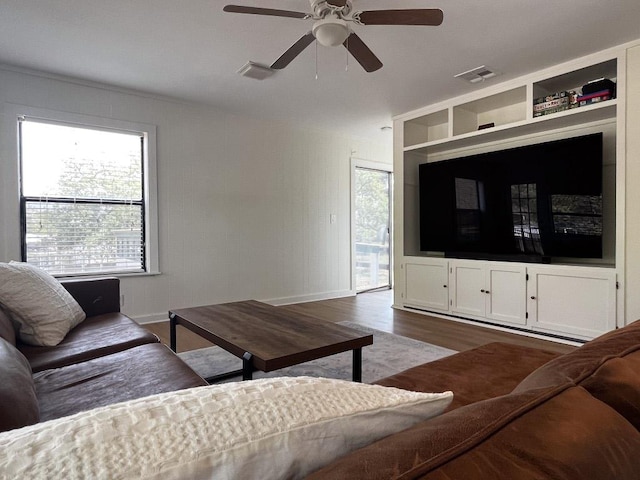 421 E Briarway Dr, Marble Falls, TX 78654 - living room featuring wood finished floors, ceiling fan, and baseboards