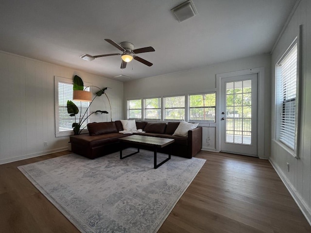 421 E Briarway Dr, Marble Falls, TX 78654 - living area featuring healthy amount of natural light, ceiling fan, and dark wood finished floors