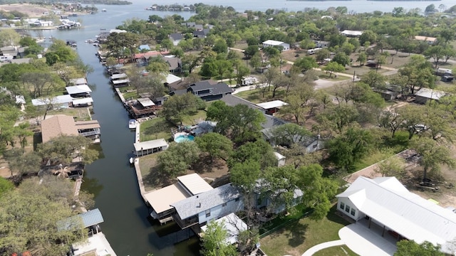 421 E Briarway Dr, Marble Falls, TX 78654 - aerial view of property and surrounding area with a nearby body of water and nearby suburban area
