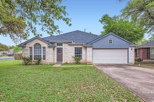 ranch-style home with roof with shingles, stone siding, driveway, a front lawn, and a garage