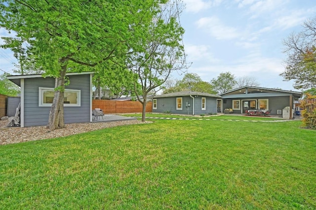7511 Saint Cecelia St, Austin, TX 78757 - view of yard with a patio area