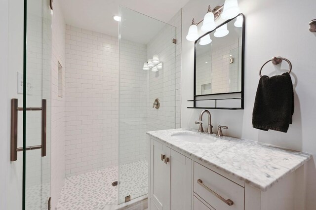 7511 Saint Cecelia St, Austin, TX 78757 - full bath with a stall shower and vanity
