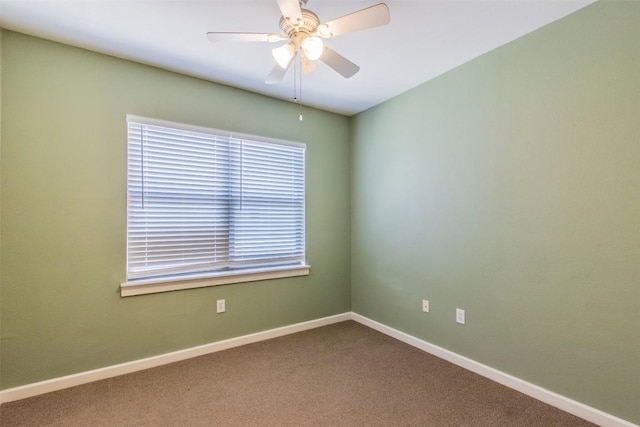 1201 Grove Blvd Unit 702, Austin, TX 78741 - unfurnished room featuring ceiling fan, carpet flooring, and baseboards
