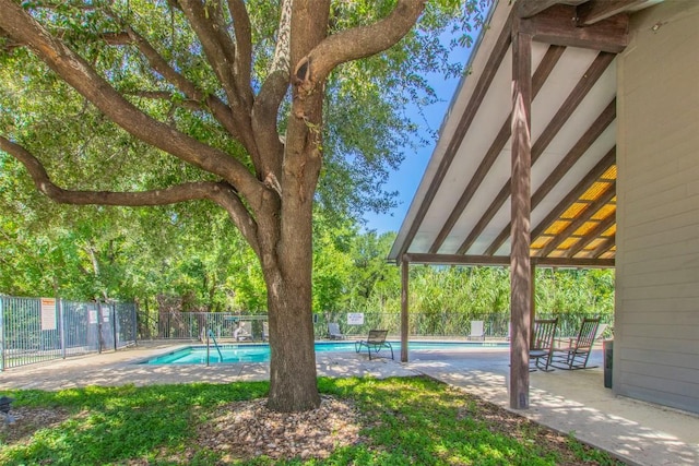 1201 Grove Blvd Unit 702, Austin, TX 78741 - fenced backyard featuring a patio and a community pool