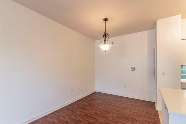 1201 Grove Blvd Unit 702, Austin, TX 78741 - unfurnished dining area with wood finished floors and baseboards